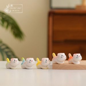 Mèo gốm đỡ đũa – Dáng ngồi ngoan xinh xắn