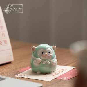 An Hòa – Khỉ gốm ôm vàng mang niềm vui tự tại